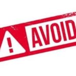 Warning sign with "AVOID" text, emphasizing caution related to plumbing issues and maintenance.