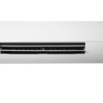 Heat pump unit on a wall, illustrating energy-efficient heating and cooling solutions relevant to HVAC services.