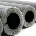 Gray foam pipe insulation tubes for HVAC and plumbing projects at Carmine's Plumbing, Heating & Air Conditioning.
